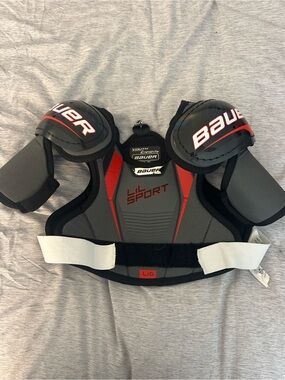 Bauer Youth Hockey Shoulder Pad — Black with Gray and Red Details